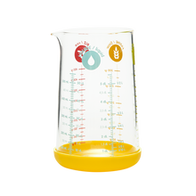 Load image into Gallery viewer, Pebbly Yellow Glass Measuring Jug with Silicone Base - 500 ml