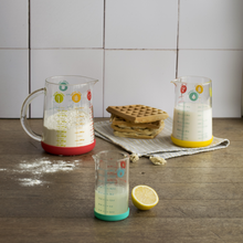 Load image into Gallery viewer, Pebbly Yellow Glass Measuring Jug with Silicone Base - 500 ml