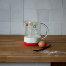 Load image into Gallery viewer, Pebbly Red Glass Measuring Jug with Silicone Base - 1000 ml