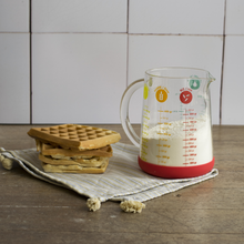 Load image into Gallery viewer, Pebbly Red Glass Measuring Jug with Silicone Base - 1000 ml