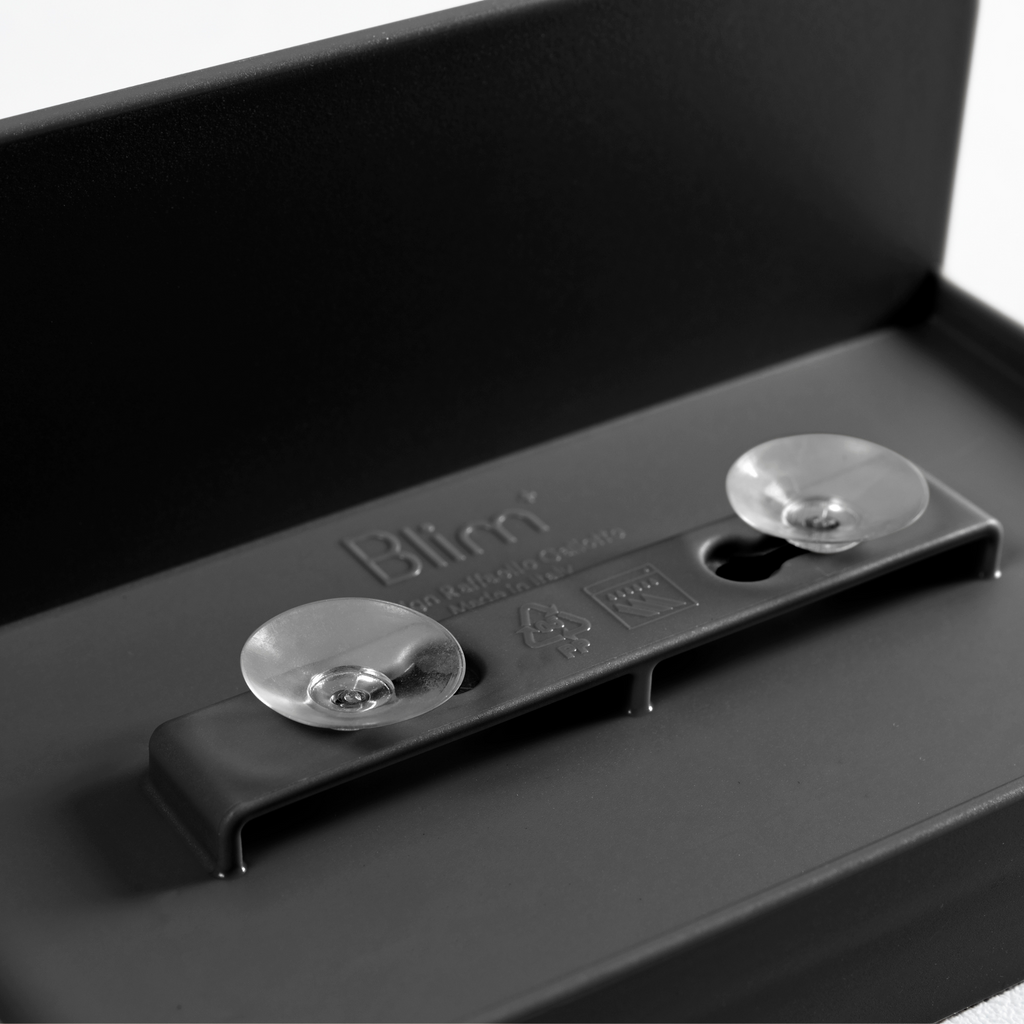 Blim+ Battigia Sponge Holder in black, underside showing the suction cups