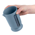 Blim+ QB Carafe Small in blue, held in a hand