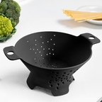 Blim+ Cosmo Colander Medium in black, on a kitchen counter