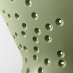 Blim+ Cosmo Colander Medium in green, close-up of the drainage holes