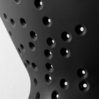 Blim+ Cosmo Colander Medium in black, close-up of the drainage holes
