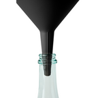 Blim+ Dolina Funnel in black, placed in a glass bottle