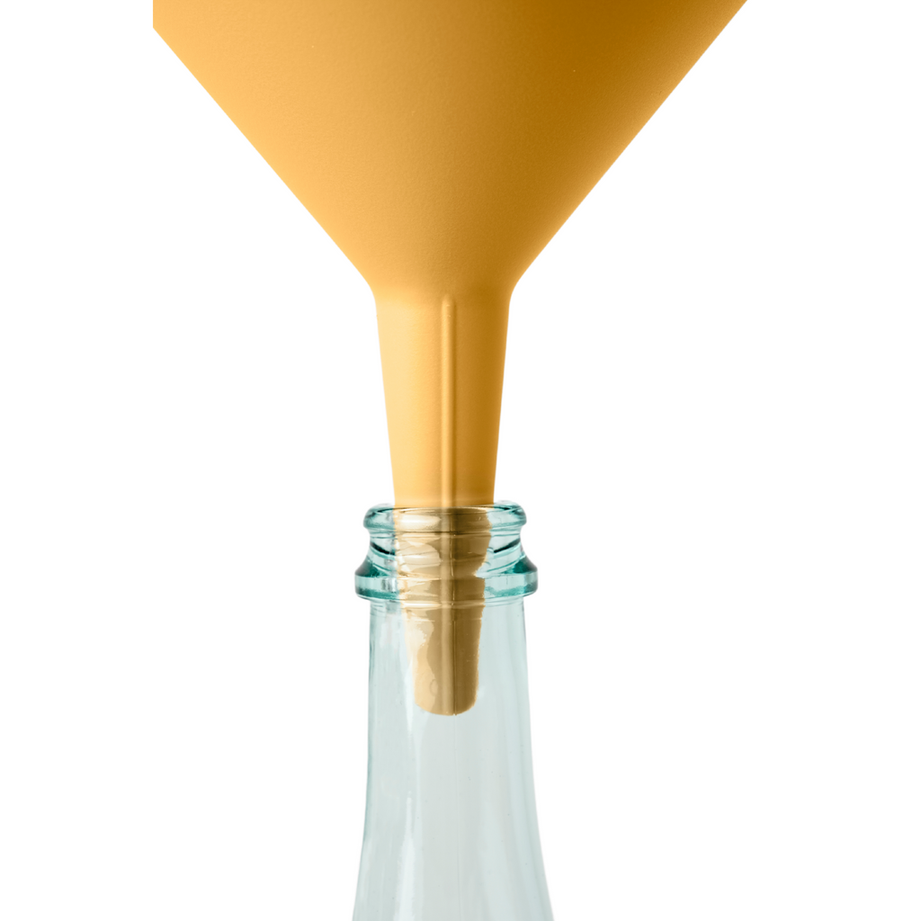 Blim+ Dolina Funnel in yellow, placed in a glass bottle