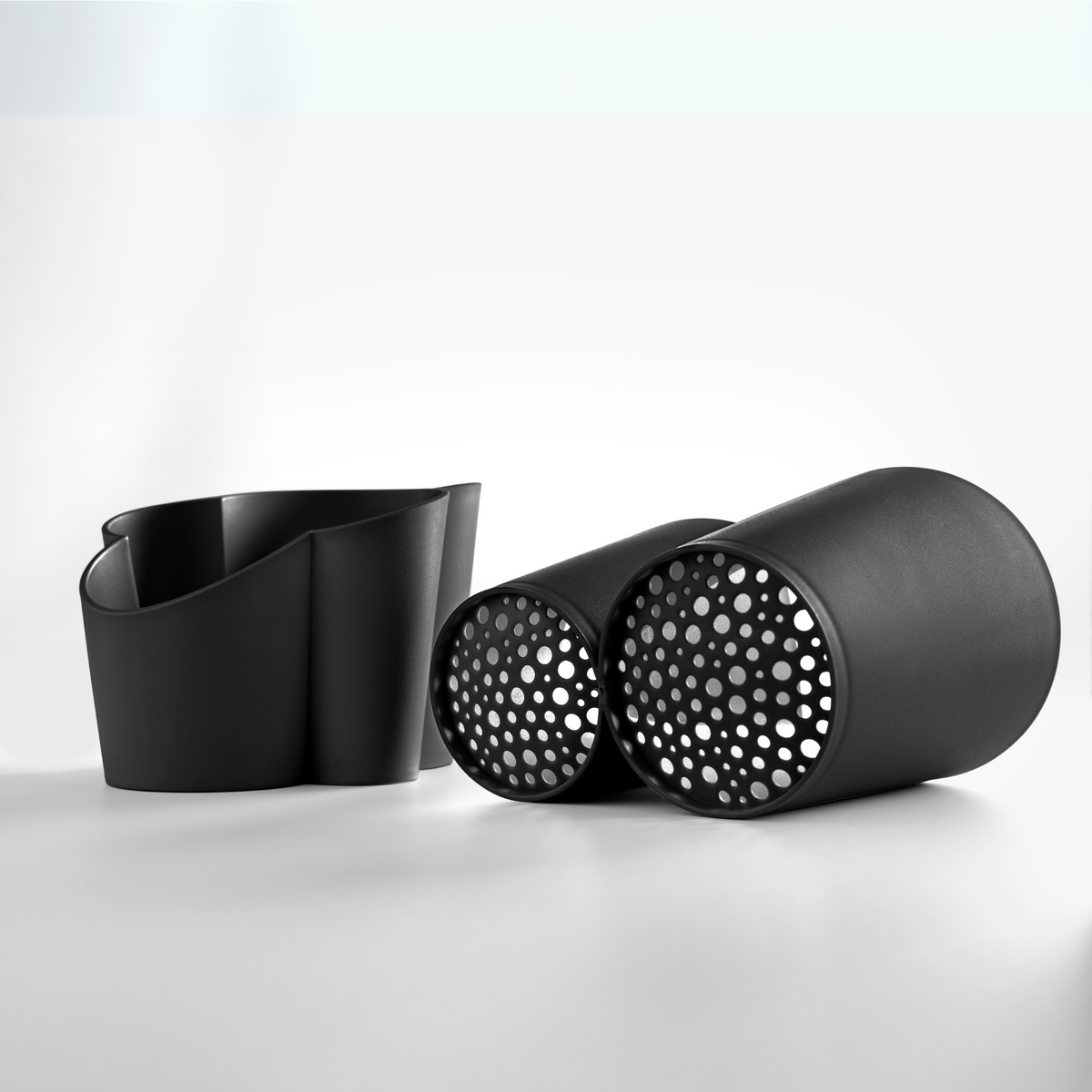 Blim+ Gocciolo Cutlery Drainer in black, with the two parts shown side by side