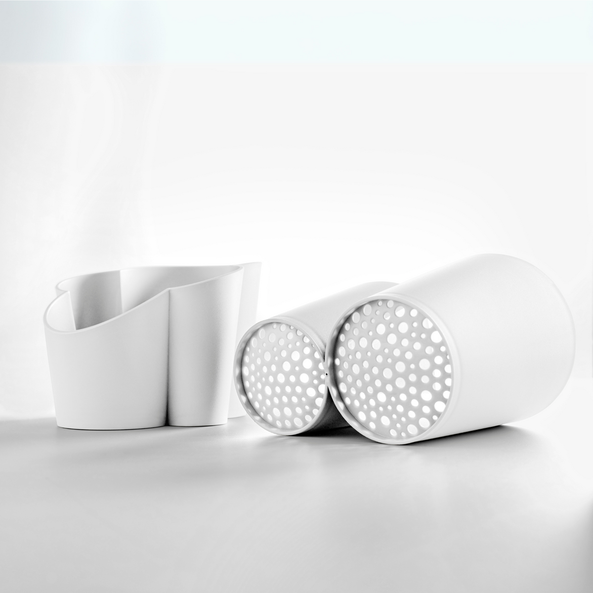 Blim+ Gocciolo Cutlery Drainer in white, with the two parts shown side by side
