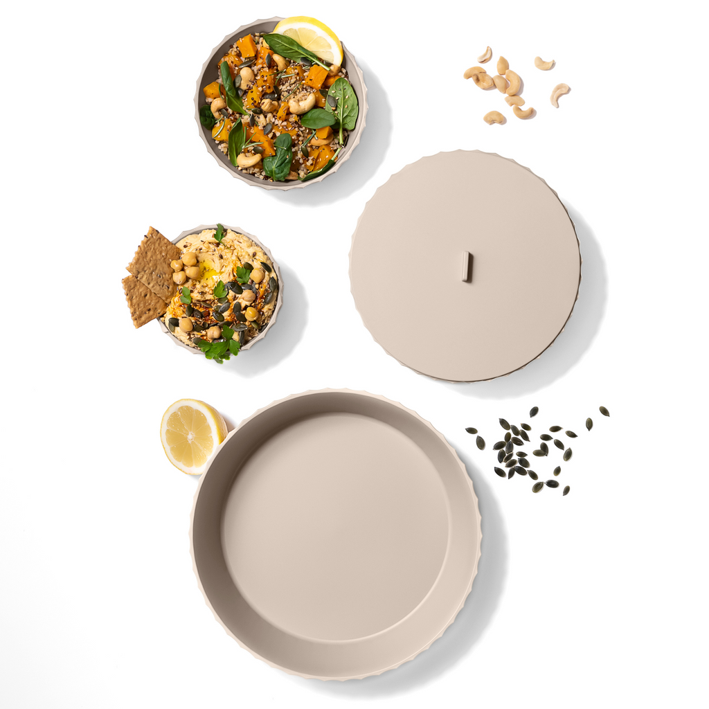 Blim+ Nettuno Bowl Large in beige, seen from above beside a bowl of food