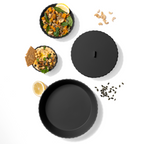 Blim+ Nettuno Bowl Large in black, seen from above beside a bowl of food