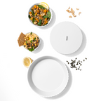 Blim+ Nettuno Bowl Large in white, seen from above beside a bowl of food