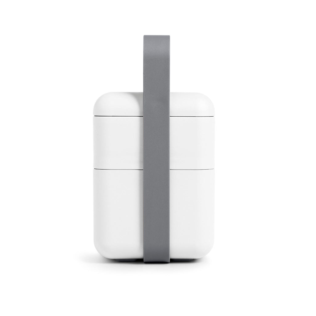 Blim+ Lunchbox Bauletto Medium in white with the handle raised, front view