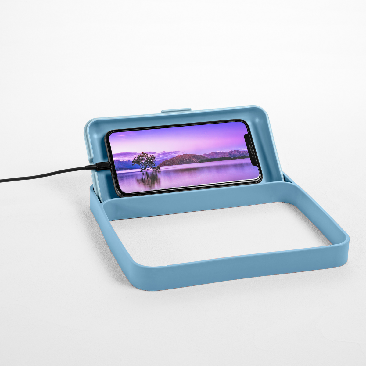 Blim+ Lunchbox Bauletto Medium in blue, lid used as a phone stand