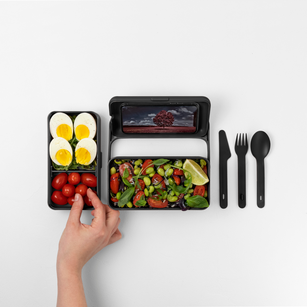 Blim+ Lunchbox Bauletto Medium in black, open with salad, boiled eggs and cutlery