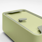 Blim+ Lunchbox Bauletto Small in green, close-up of the lid and handle
