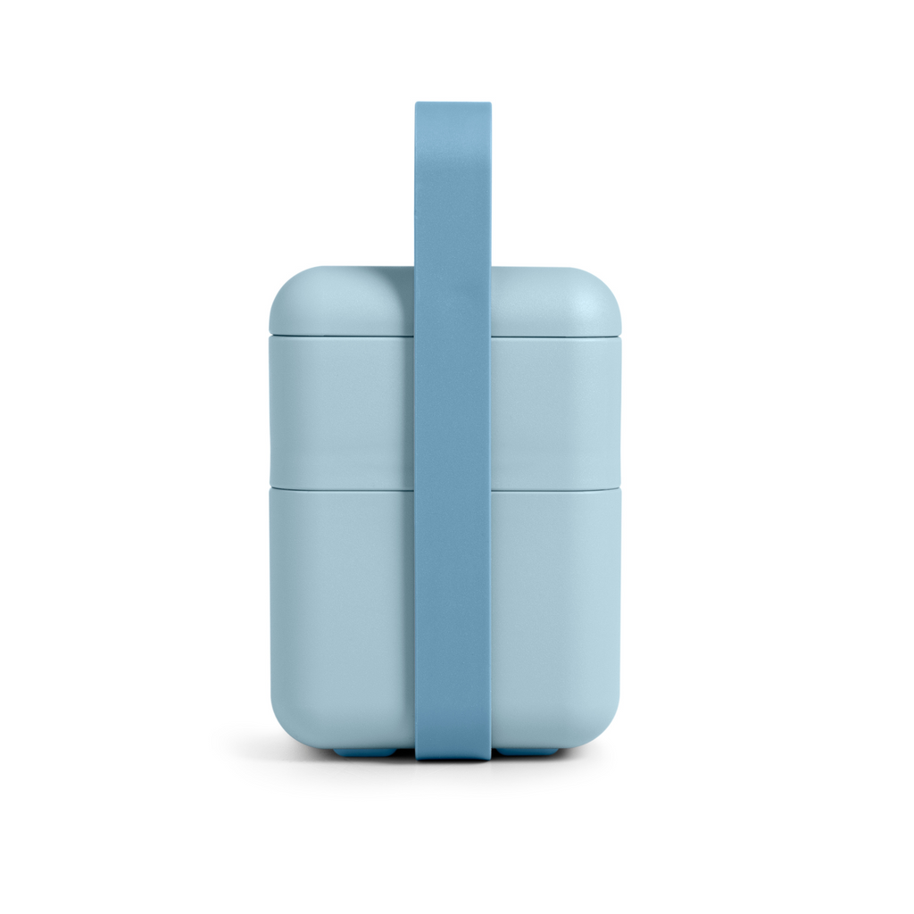Blim+ Lunchbox Bauletto Medium in blue with the handle raised, front view