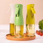 Zuutii Oil Sprayer in cream, green and yellow on a wooden tray