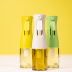 Zuutii Oil Sprayer in yellow, cream and green on a yellow background