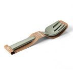 Blim+ Serving Tools Paestum in green, the serving spoon and fork in their packaging