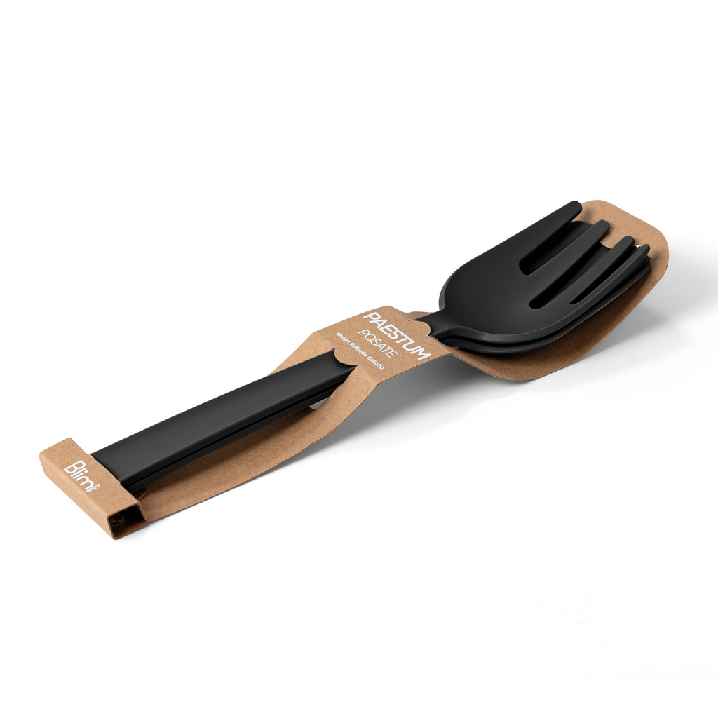 Blim+ Serving Tools Paestum in black, the serving spoon and fork in their packaging