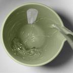 Blim+ QB Carafe in green, seen from above with water being poured in
