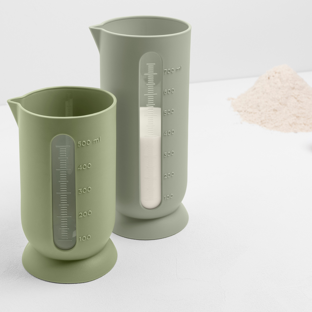 Blim+ QB Carafe Small and Medium in green, side by side with flour measured in