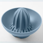 Blim+ UFO Juicer with QB Carafe in blue, juicer top seen from above