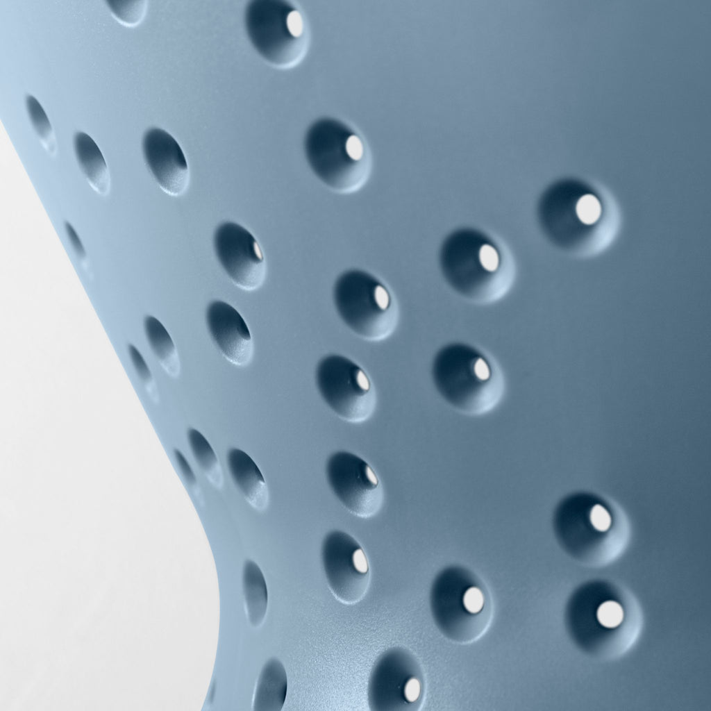 Blim+ Cosmo Colander Medium in blue, close-up of the drainage holes