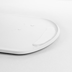 Blim+ Skateboard Chopping Board Medium in white, angled view of the raised edge