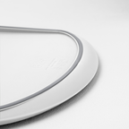 Blim+ Skateboard Chopping Board Medium in white, close-up of the grey silicone edge