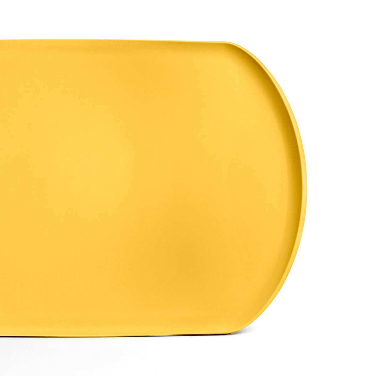 Blim+ Skateboard Chopping Board Medium in yellow, top view