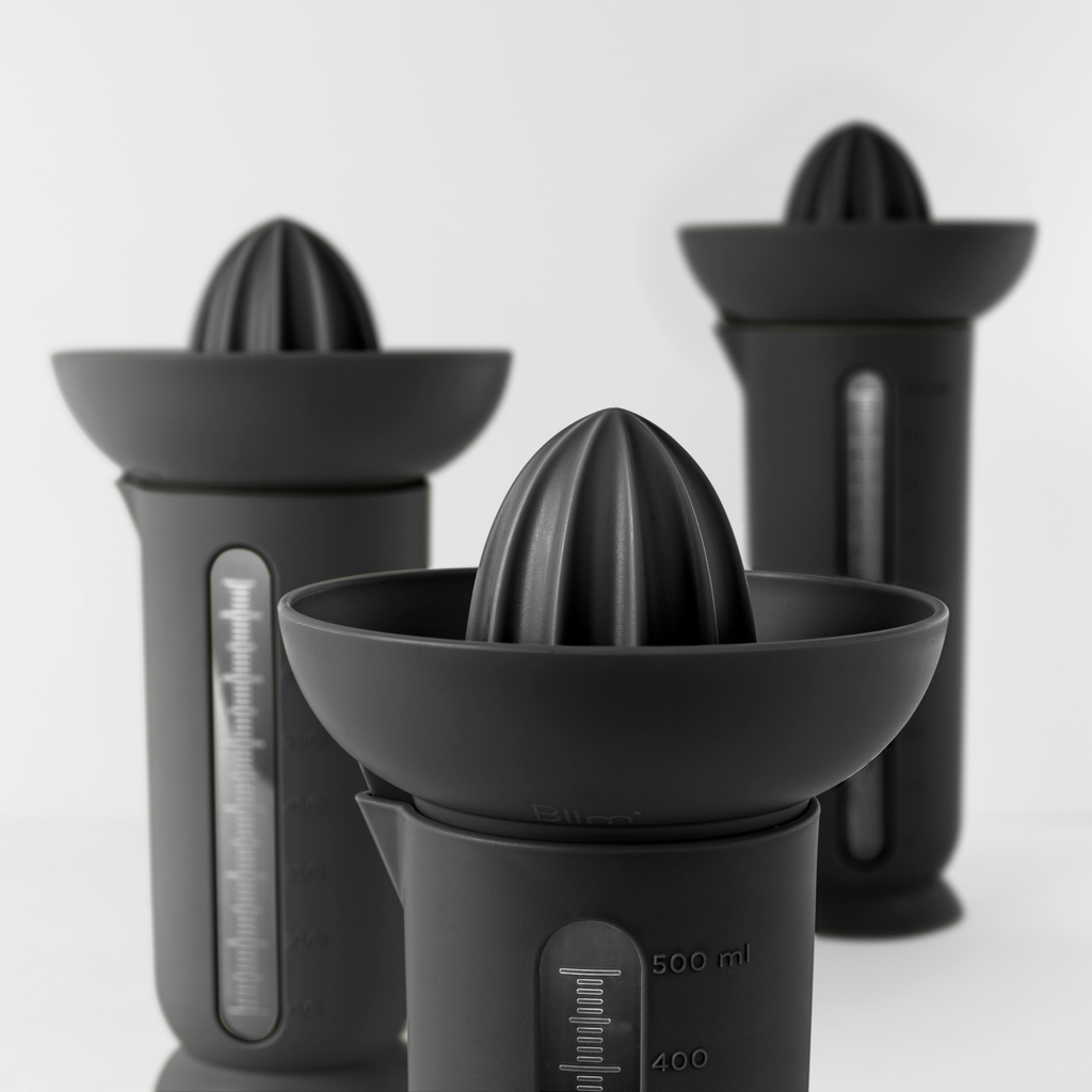 Blim+ UFO Juicer with QB Carafe in black, with juicer and carafes in different sizes