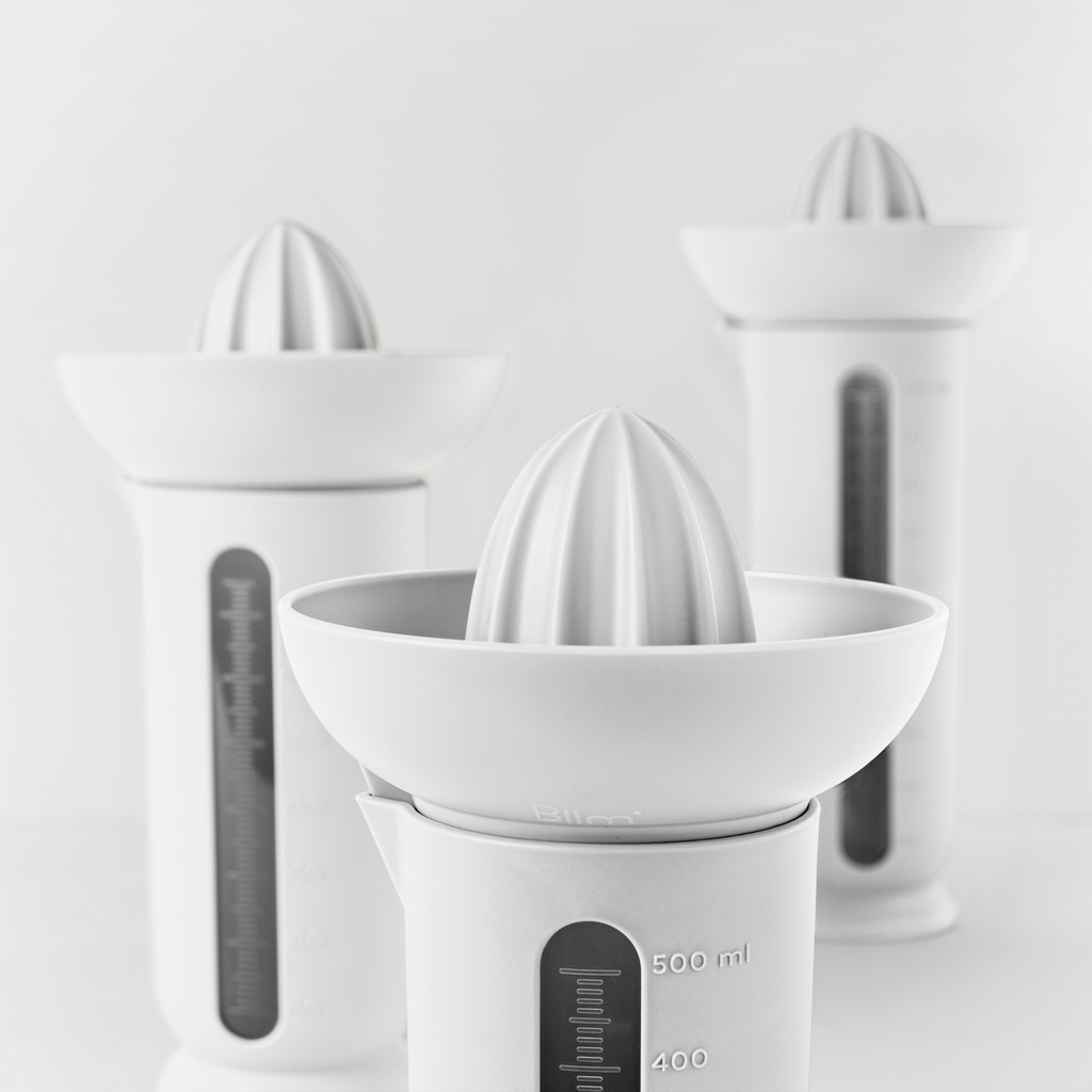 Blim+ UFO Juicer with QB Carafe in white, with juicer and carafes in different sizes