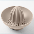 Blim+ UFO Juicer with QB Carafe in taupe, juicer top seen from above