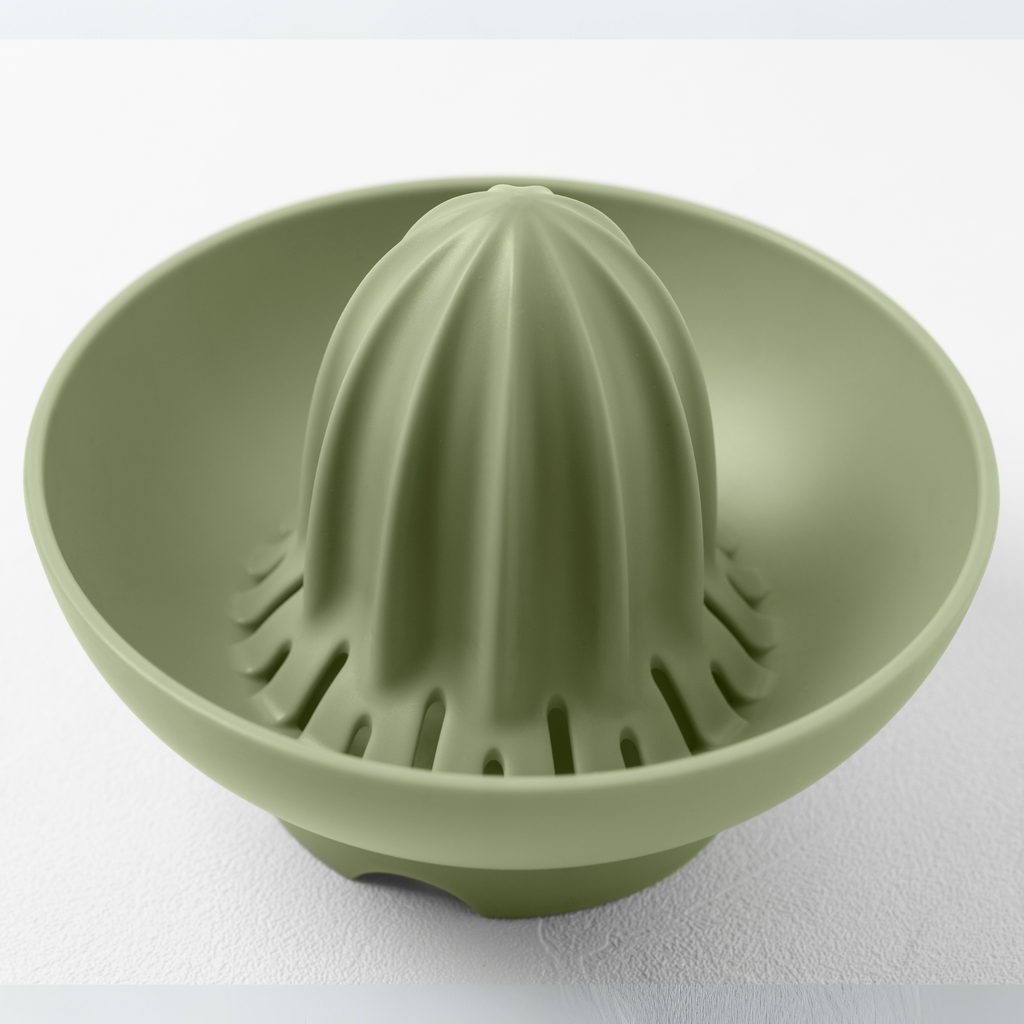 Blim+ UFO Juicer with QB Carafe in green, juicer top seen from above