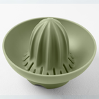 Blim+ UFO Juicer with QB Carafe in green, juicer top seen from above