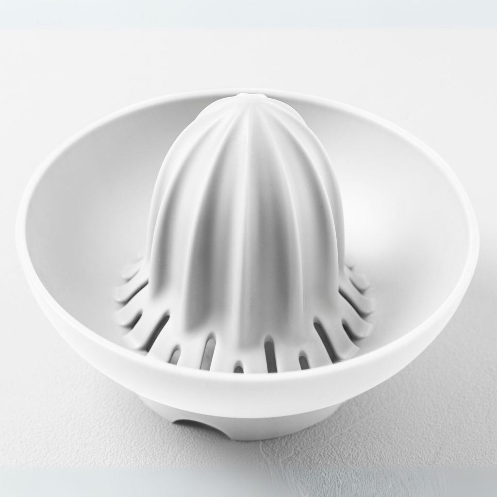 Blim+ UFO Juicer with QB Carafe in white, juicer top seen from above