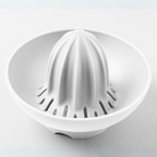 Blim+ UFO Juicer with QB Carafe in white, juicer top seen from above