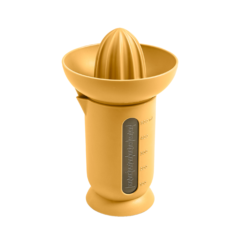 Blim+ UFO Juicer with QB Carafe in yellow, front view
